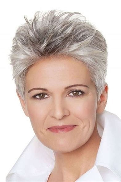 Silver layered pixie haircut with volume on top for older women