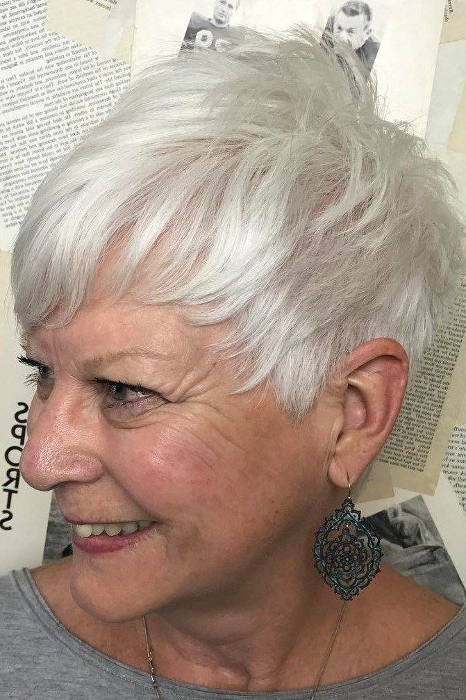 Feathered white pixie haircut with full crown volume