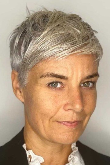 Close-cropped silver pixie haircut close-up portrait