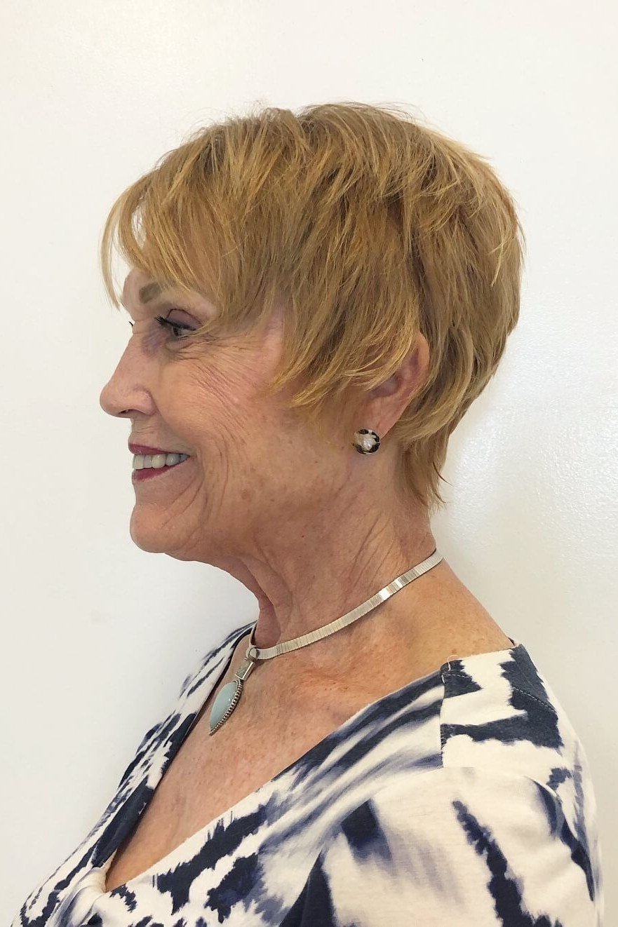 Golden blonde pixie haircut side profile