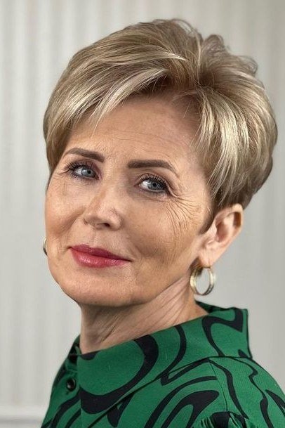 Tapered Ash Blonde Pixie with Height - pixie hairstyle for women over 40