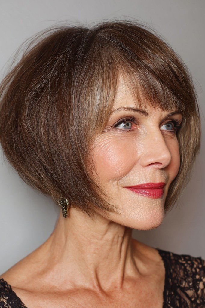 Brunette Layered Pixie with Bangs - pixie hairstyle for women over 40