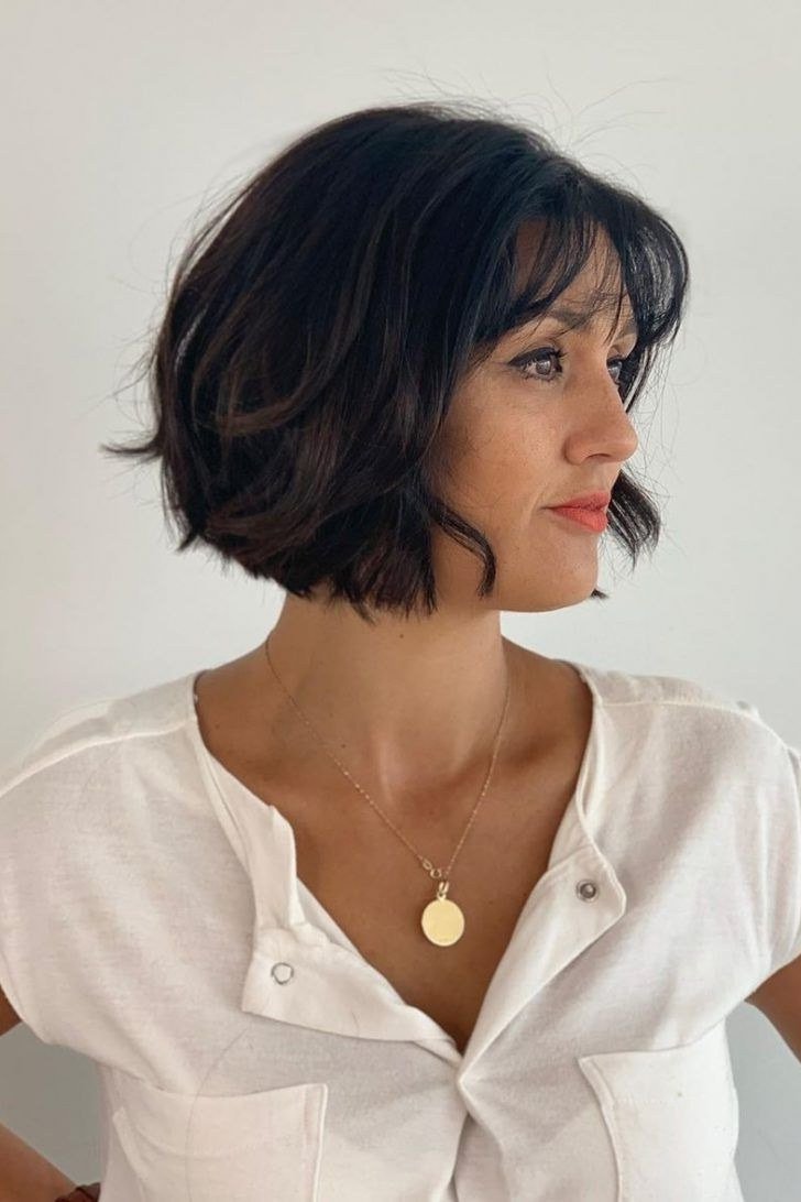 Dark Pixie Bob with Bangs - pixie hairstyle for women over 40