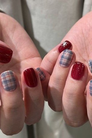 Burgundy nails with gray blue plaid accent nails