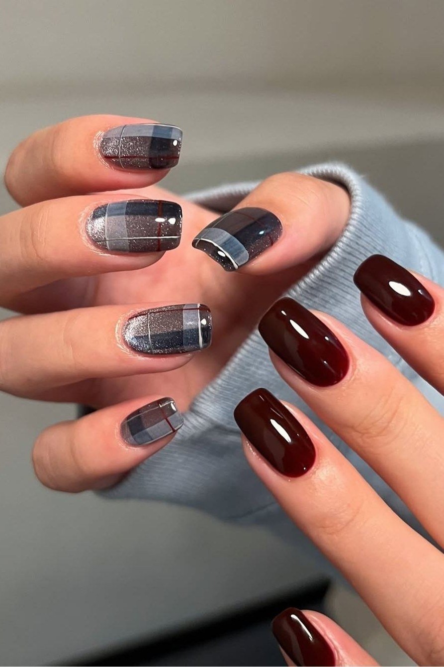 Oxblood red nails with smoky gray plaid on short squoval nails