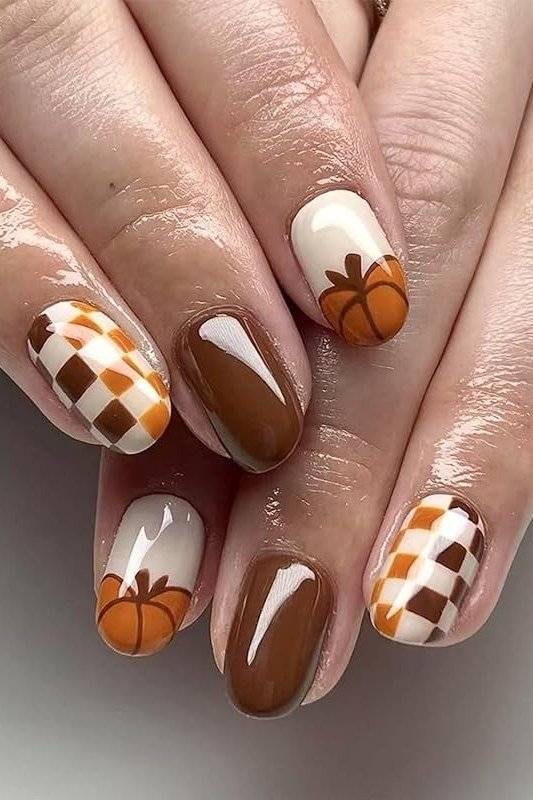 Chocolate brown nails with pumpkin and gingham nail art