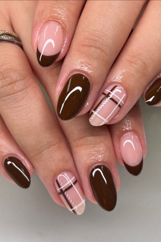 Chocolate brown nails with plaid and french tip accents