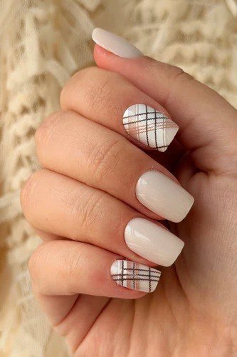 White and nude plaid nails with cream knit sweater