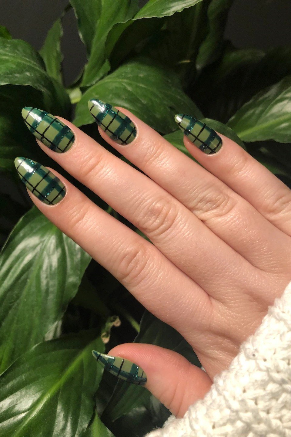 Green and black windowpane plaid on almond nails