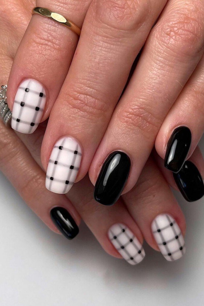 Black nails with white and black gingham accents