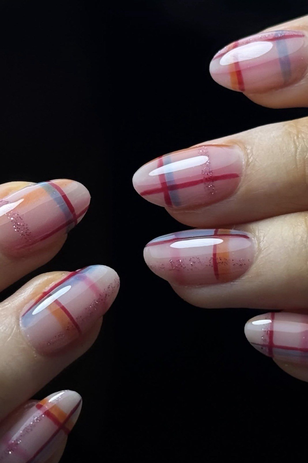Pastel pink and blue windowpane plaid on sheer nails