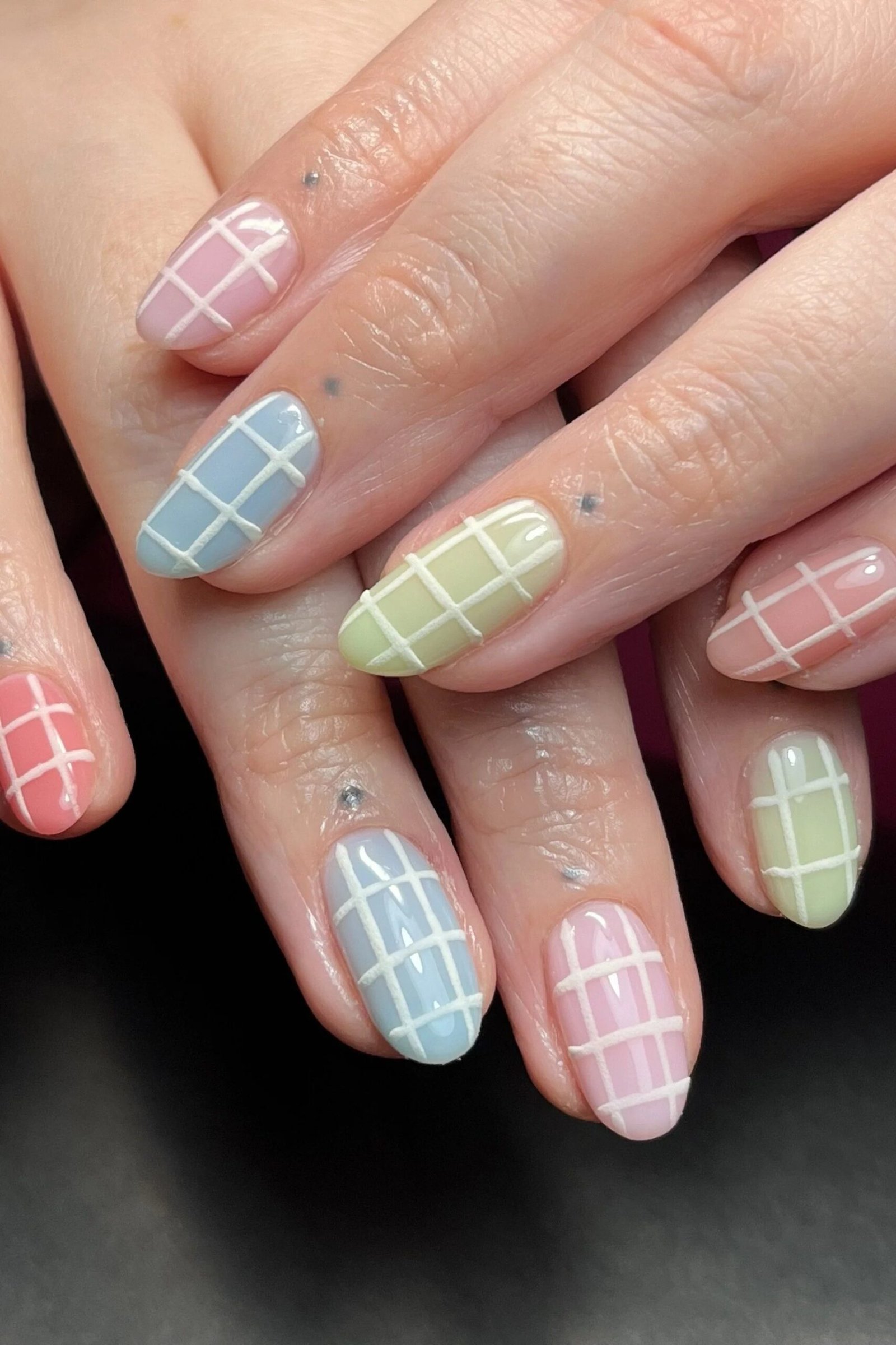 Pastel gingham nails in pink blue and green
