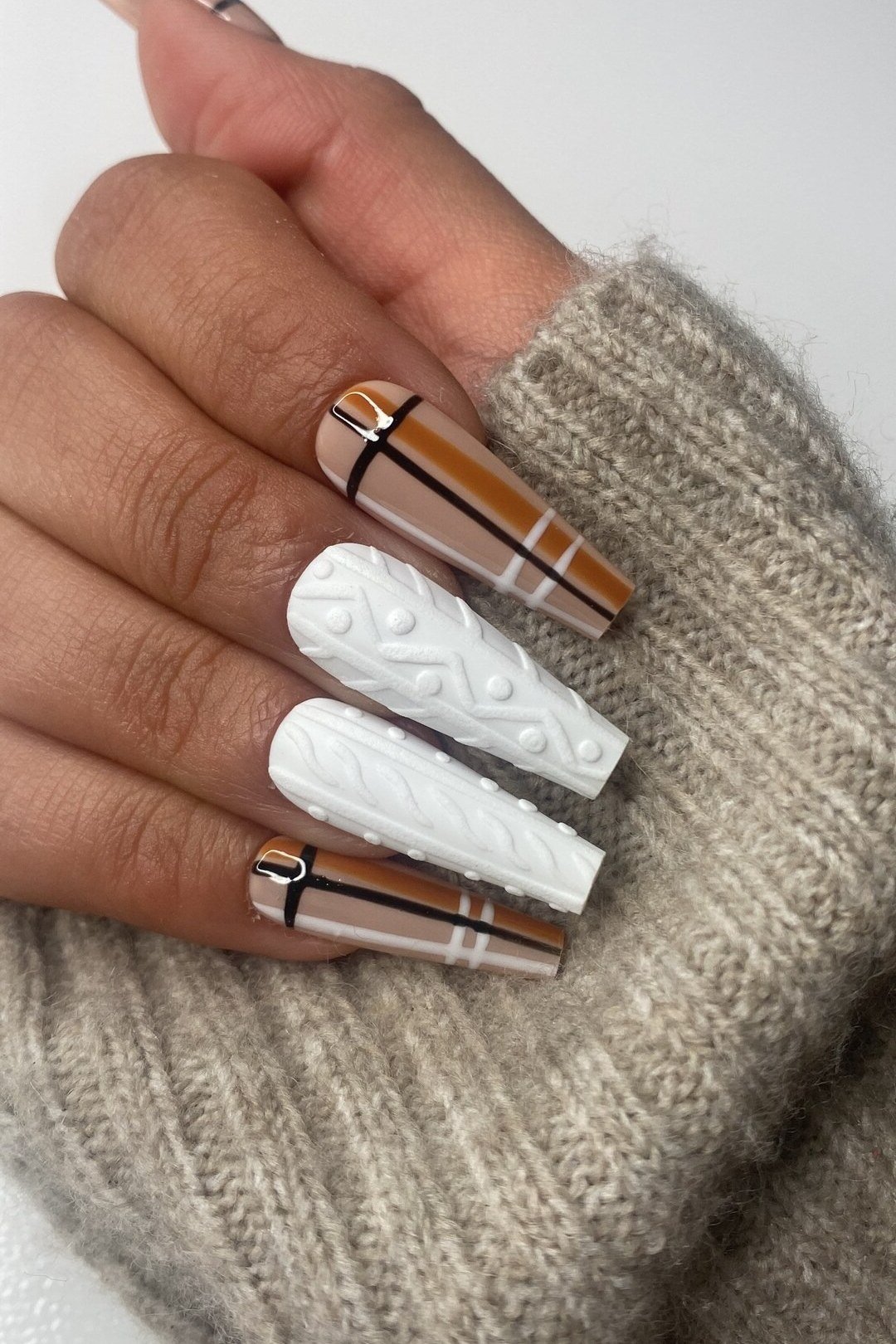 White sweater knit nails with brown plaid