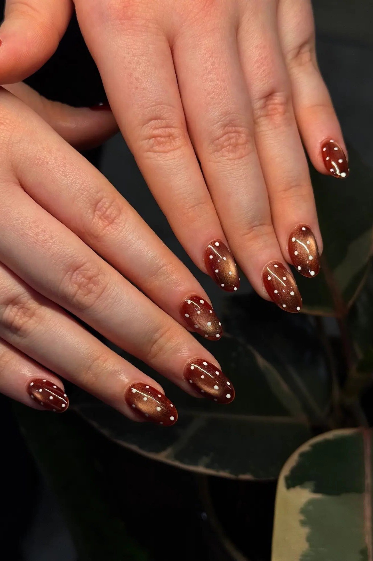 Burgundy short nails with white polka dots, simple fall nail design for women over 50