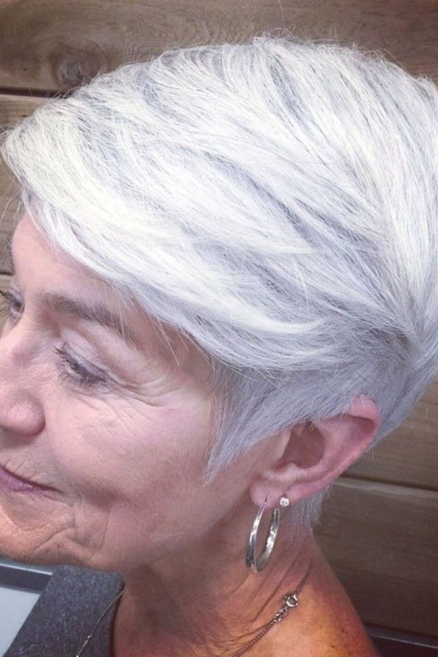 Smooth sleek white pixie haircut for older women
