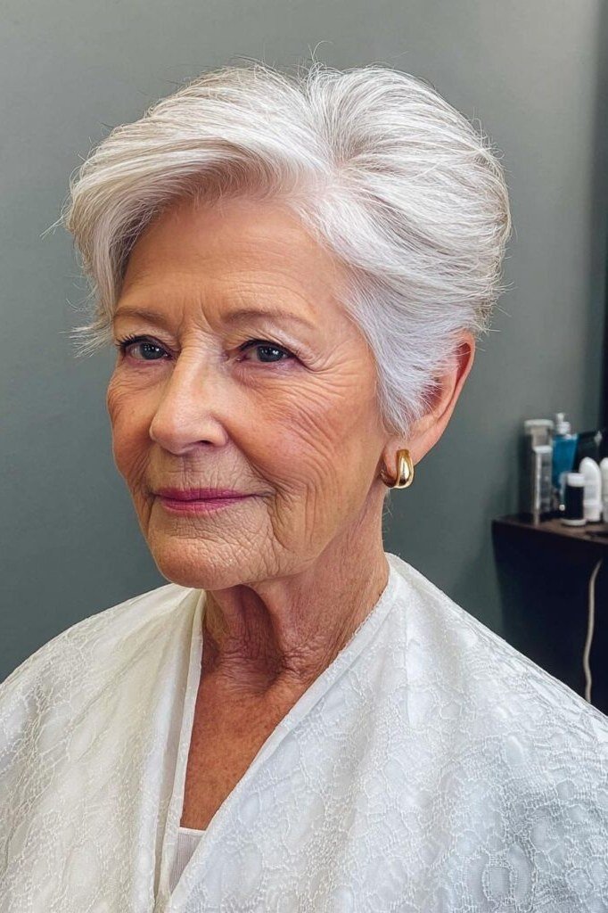 Classic silver pixie cut for older women, side profile