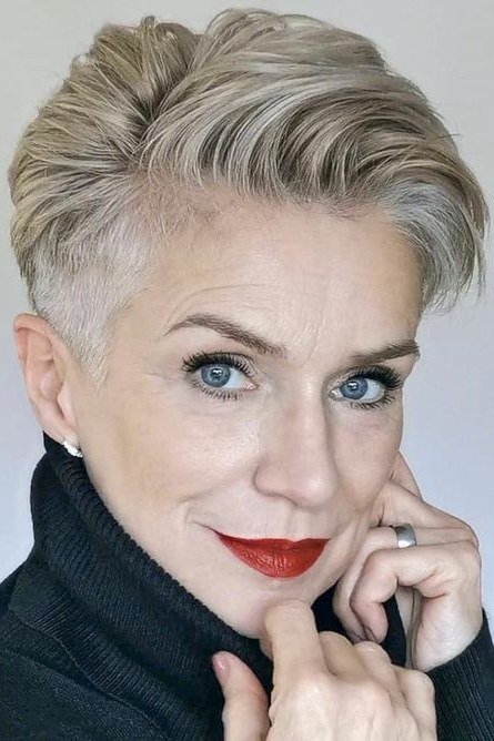 Elegant silver pixie with red lipstick for women over 60