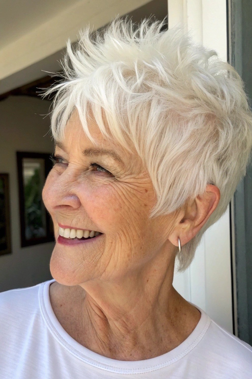 Tousled laughing white pixie with natural texture for older women