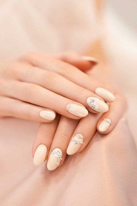 Milky Almond with White Lace Dots nail art for women over 50