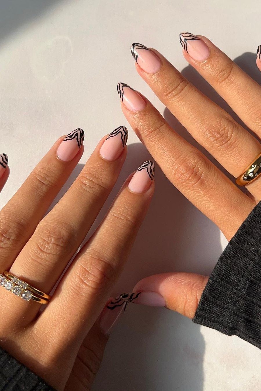 Almond with Black-Outlined French Tips - short almond nails for women over 50