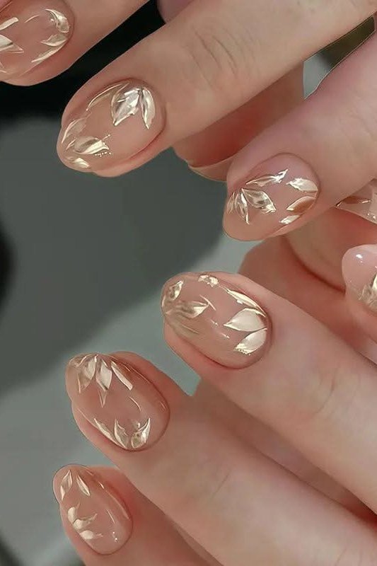 Nude Almond with Gold Leaf Art - short almond nails for women over 50