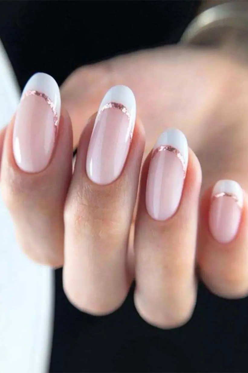 Pink-White French with Rhinestone Tips - short almond nails for women over 50