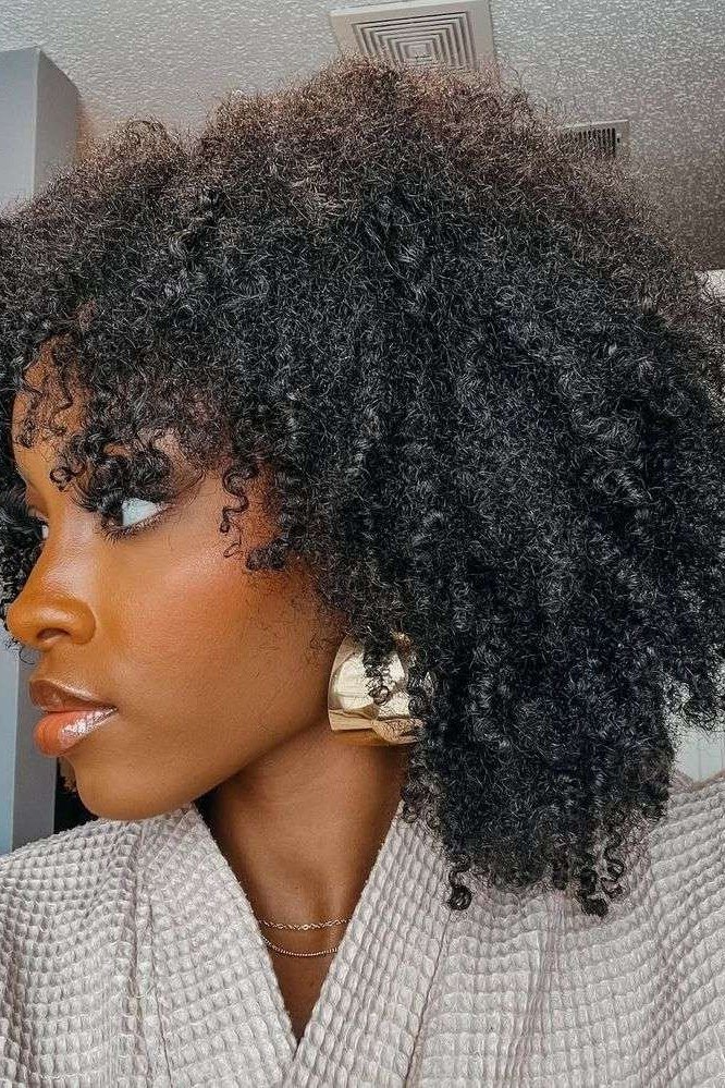 Tight, voluminous dark curls make this bob a showstopper.