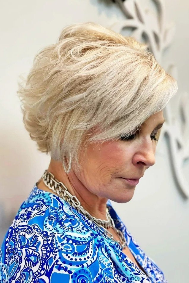 Feathered blonde textured crop haircut for women over 60