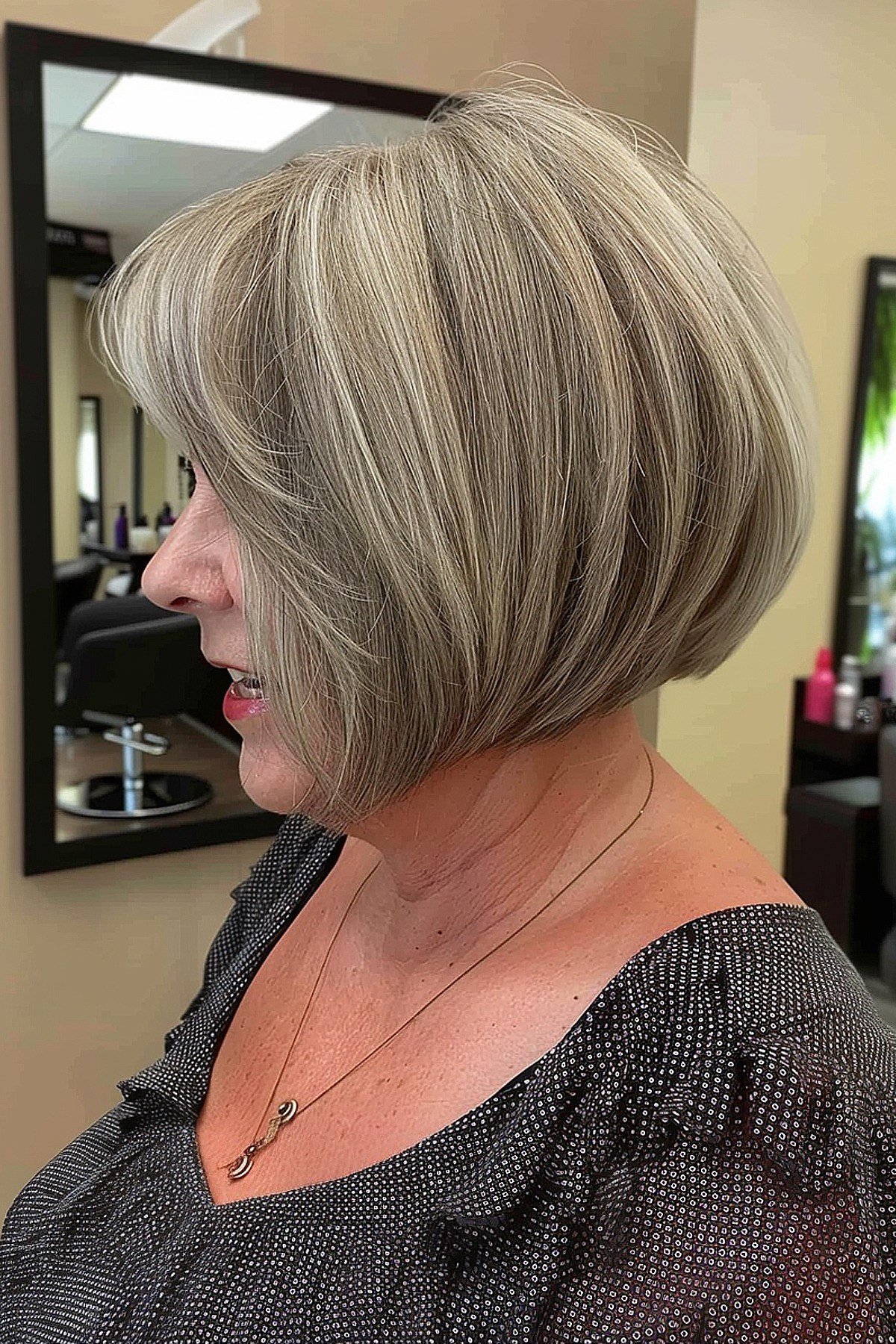 Blonde layered bob with stacked back for older women