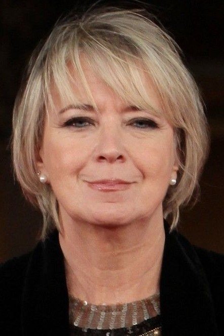 Blonde chin-length bob with soft full fringe for older women