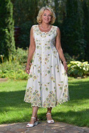 white and yellow floral sleeveless midi dress for women over 60