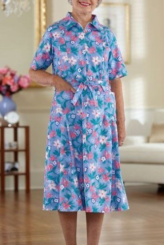 Blue and pink floral tie-belt shirt dress for women over 60: bright flowers on a knee-length A-line style with a fabric belt