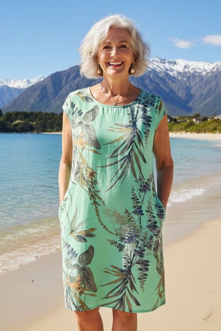 mint palm print sleeveless midi dress for women over 60