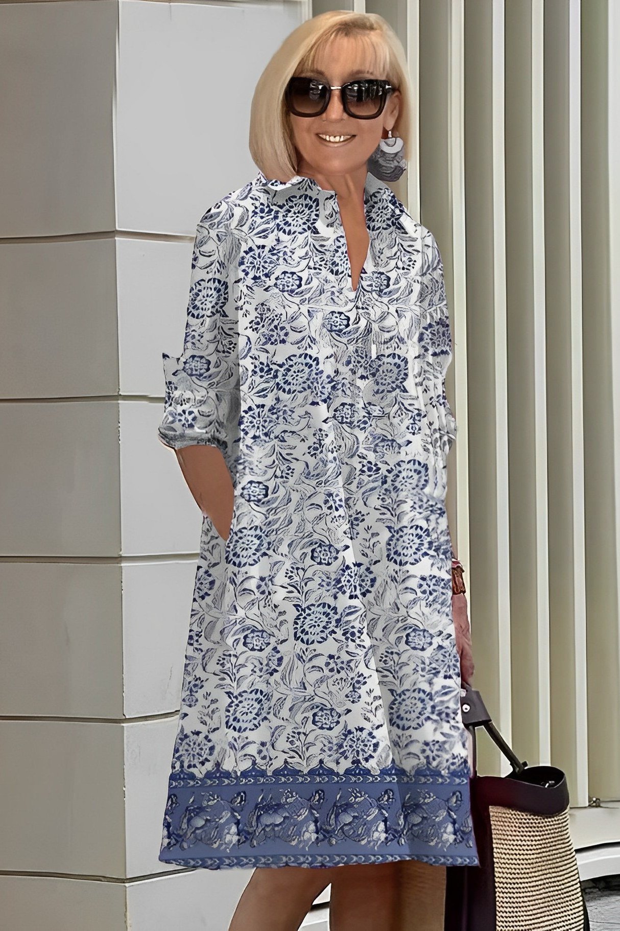 Blue and white porcelain-print shirt dress for women over 60: delicate floral motif with a solid navy hem border