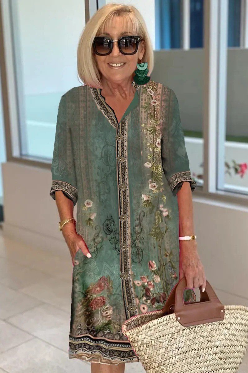 Teal embroidered tunic shirt dress for women over 60: folk-style embroidery and decorative border with three-quarter sleeves