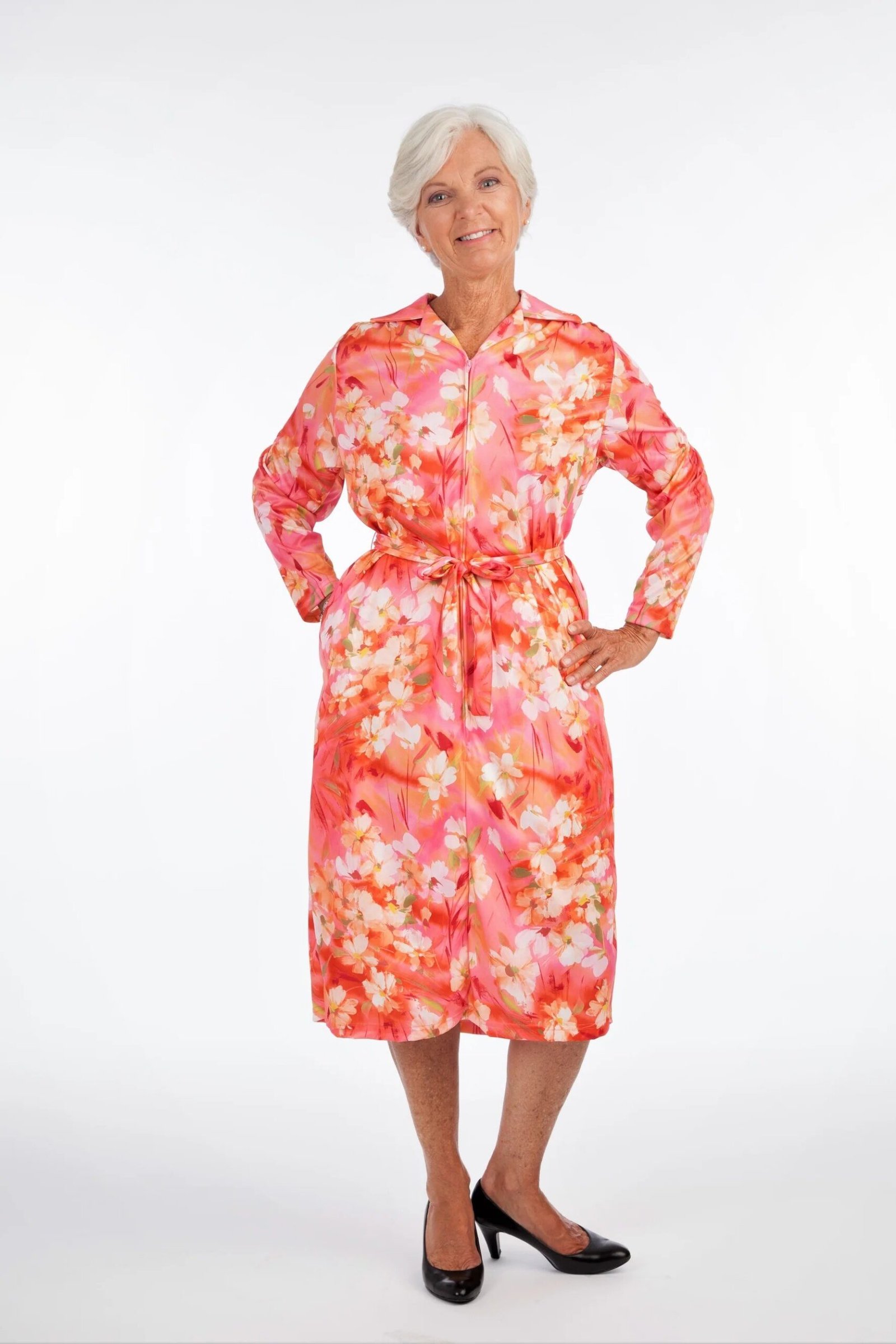 Coral floral midi shirt dress for women over 60: coral and peach blossoms with long sleeves and a self-tie belt