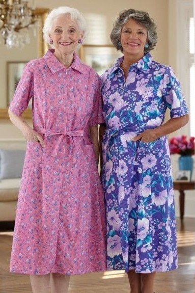 Pink and periwinkle floral shirt dresses for women over 60: two short-sleeve styles with side pockets worn by friends