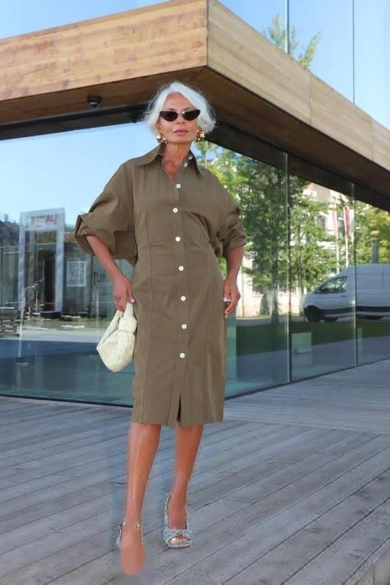 Olive button-front shirt dress for women over 60: rich olive green knee-length style with a cream handbag