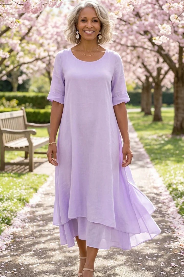 Lavender midi summer dress for older women in a garden