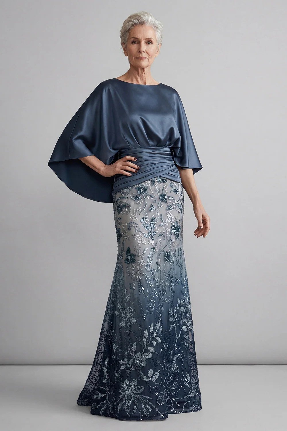 navy cape gown with floral sequin skirt, evening outfit for women over 50
