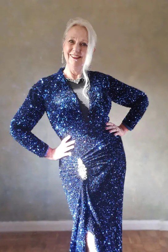 royal blue sequin wrap gown with brooch, evening outfit for women over 50