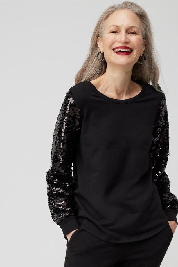 black top with sequin raglan sleeves, evening outfit for women over 50