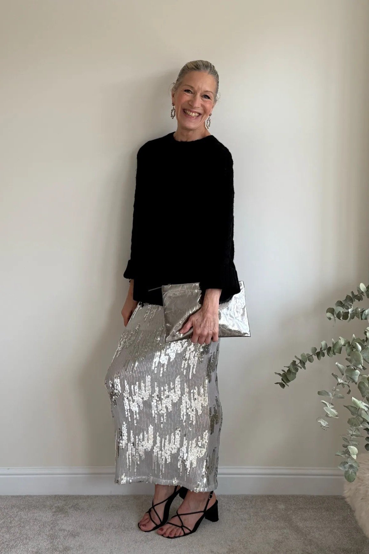 silver sequin midi skirt with black top, evening outfit for women over 50