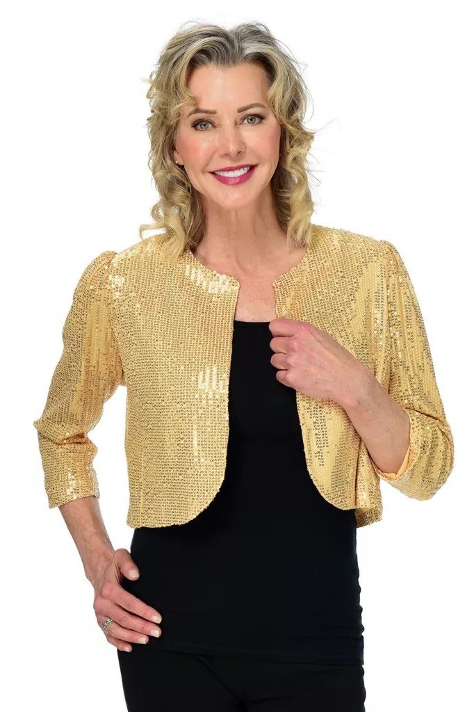 gold sequin cropped jacket over black, evening outfit for women over 50