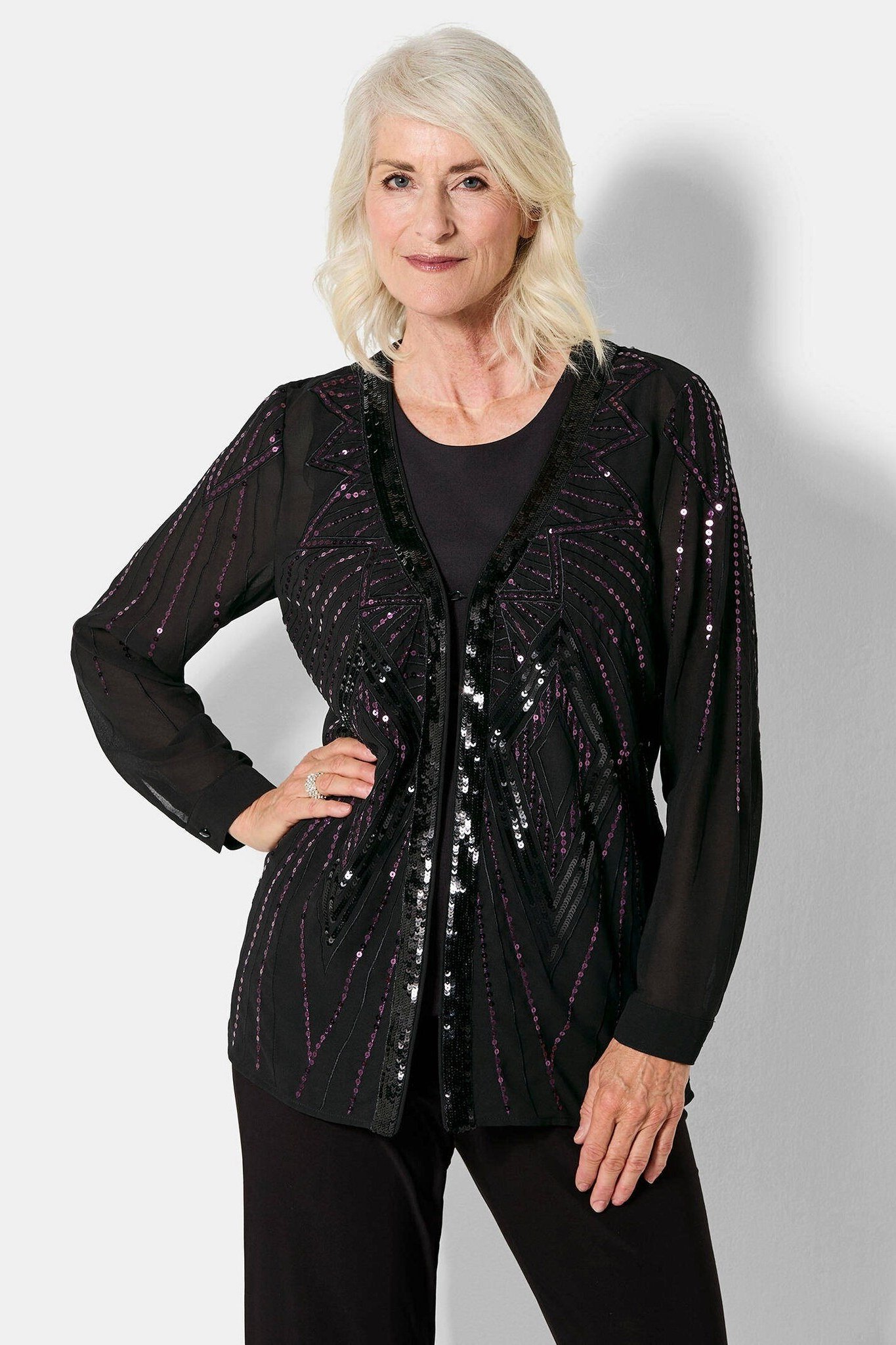 black sheer sequin cardigan over black, evening outfit for women over 50