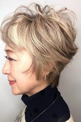 31. Blonde Pixie-Bob with Side Sweep - short haircut for women over 70 with thin hair