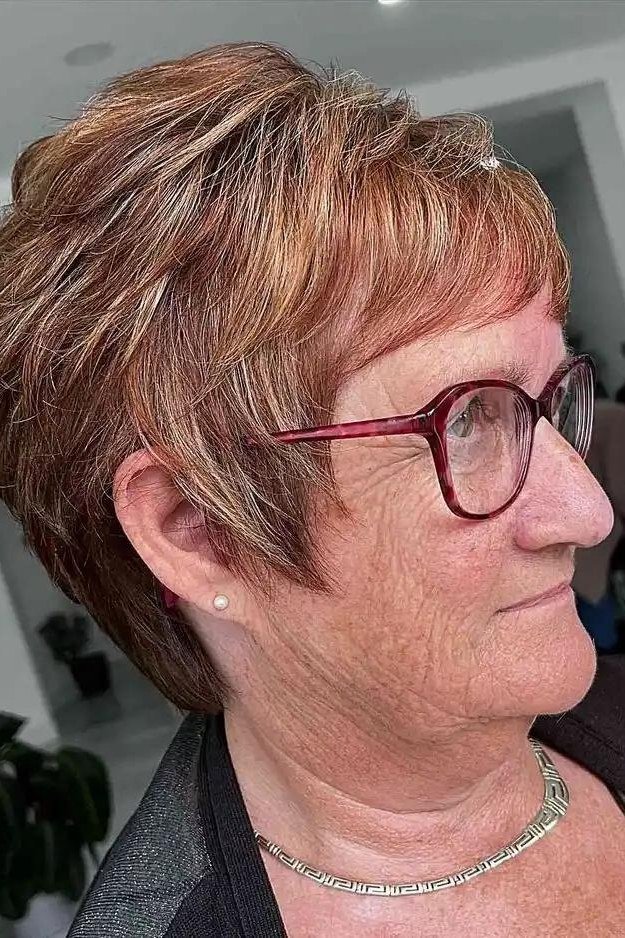 Copper shaggy pixie with glasses, side view - shaggy haircut for women over 50 with fine hair