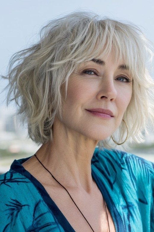 White silver shaggy bob, outdoor - shaggy haircut for women over 50 with fine hair