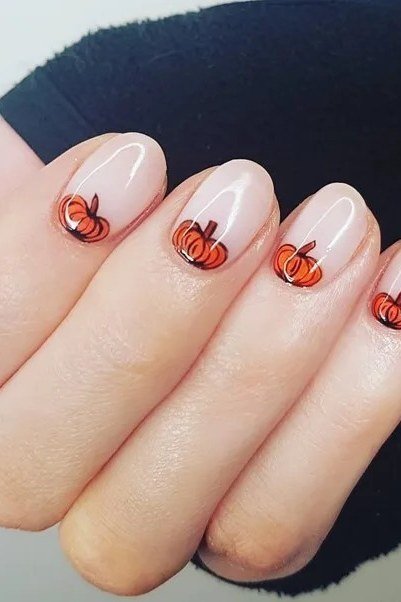 Tiny Pumpkin Accents on White Almond Nails, classy short fall nails for women over 50