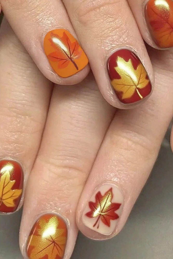 Red Chrome with Maple Leaf Art, classy short fall nails for women over 50